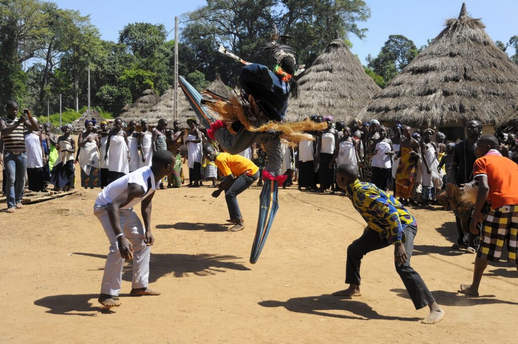 Stilt dancer in the village square